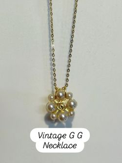 A Designer Charm Necklace (G G) With Pearls & Gold