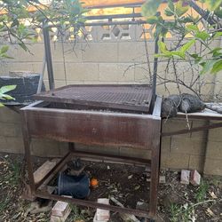 Pulley charcoal grill