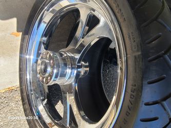 Motorcycle Tire And Rim Plus A Tire