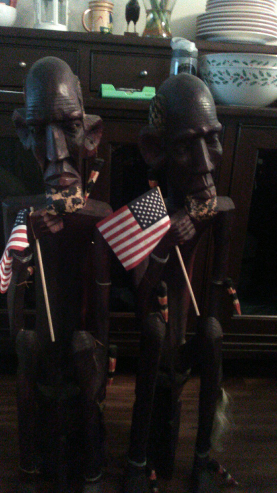 two wooden big statues