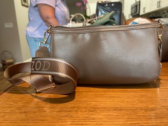Izod tan crossbody handbag