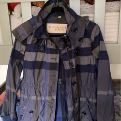 Woman’s Burberry Raincoat Size 4