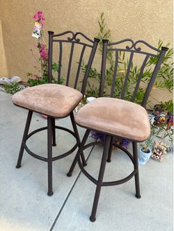 2 durable sturdy swivel high chairs that match