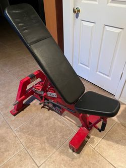 Power lift adjustable weight bench