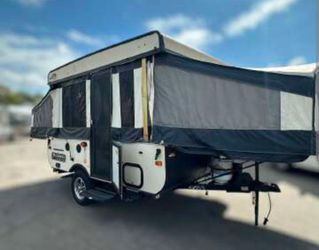 Palomino Pop up camper trailer for sale only used 10 times Has Ice Cold AC unit, fridgerator and heater and kitchen sink included $4500 obo