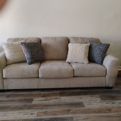 Beige Sofa with 4 Pillows 