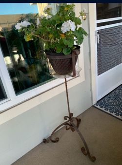 Tall wrought iron vintage plant stand