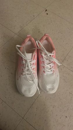 Pink and white sneakers