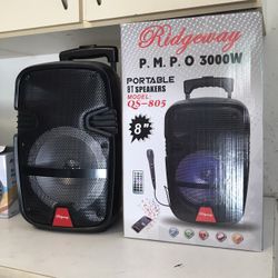 Rechargeable Music player - 8” Woofer  MICROPHONE & CHARGER INCLUDED ! Bluetooth - Fm Radio - Rechargeable  USB PORT - SD MEMORY SLOT - Portable  Comp