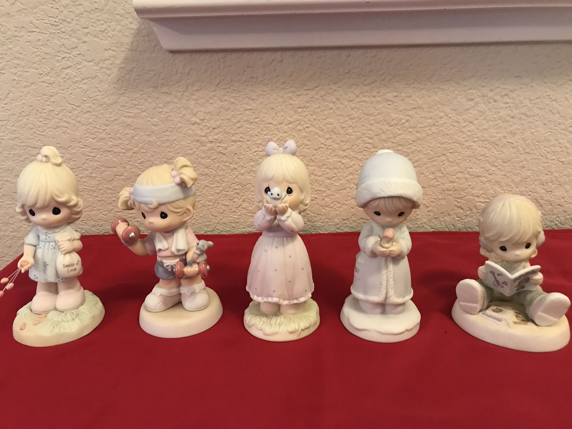 A group of 5 Vintage Precious Moments figurines