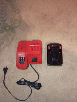 Milwaukee Rapid Charge Dual Battery System With Brand New 6.0 Battery With It