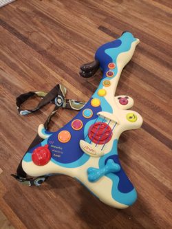 My B toy acoustic, electric, howl guitar works good