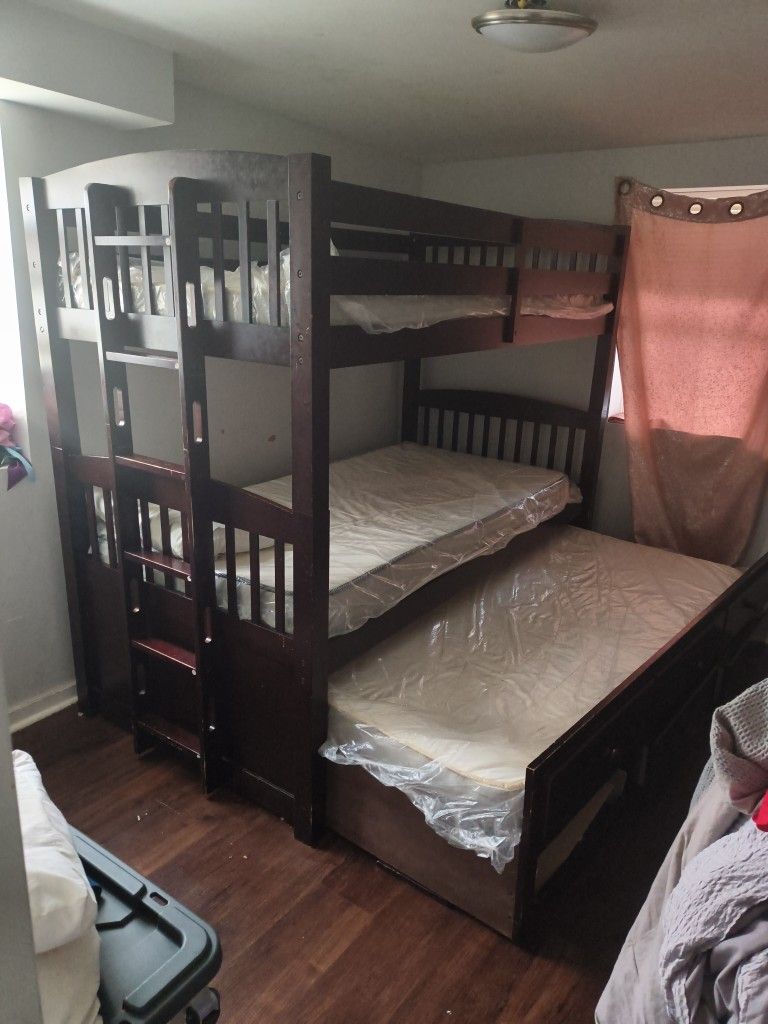 Wood Bunk Bed With Trundle. Comes With All Three Mattress Still In Plastic