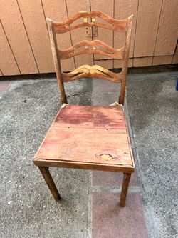 Antique Wooden Chair with Carved Back