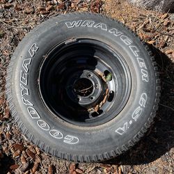 GM 15” Rim And Tire