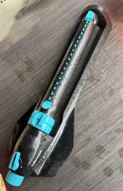 Gilmour 4000 Sq Ft Medium Duty Rectangular Sprinkler with Straight Plastic Tube with Plastic Base with Width Control with On/Off. 