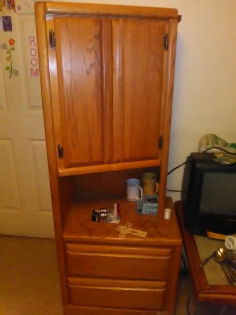 Oak shelves just over 5ft tall can be used for corner decor