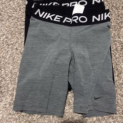 5” medium Nike pros black and Grey