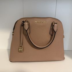Pink Michael Kors handbag with gold accents