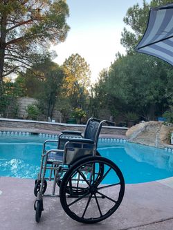 WHEELCHAIR.         WHEELCHAIRS