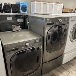 LG washer and dryer set electric mega capacity with one included pedestal