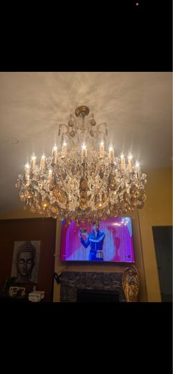 Large gold colored Crystal Chandelier with Candle Lights