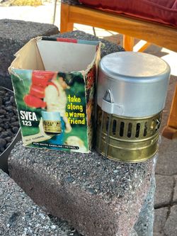 SVE 123 1970’s vintage camp stove and drinking cup.  Made in Sweden