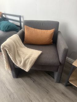 Two gray fabric chaise chairs