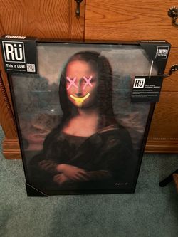 Limited Addition Art Mona Lisa with X eyes and  a yellow melting smile. Very cool piece of art.