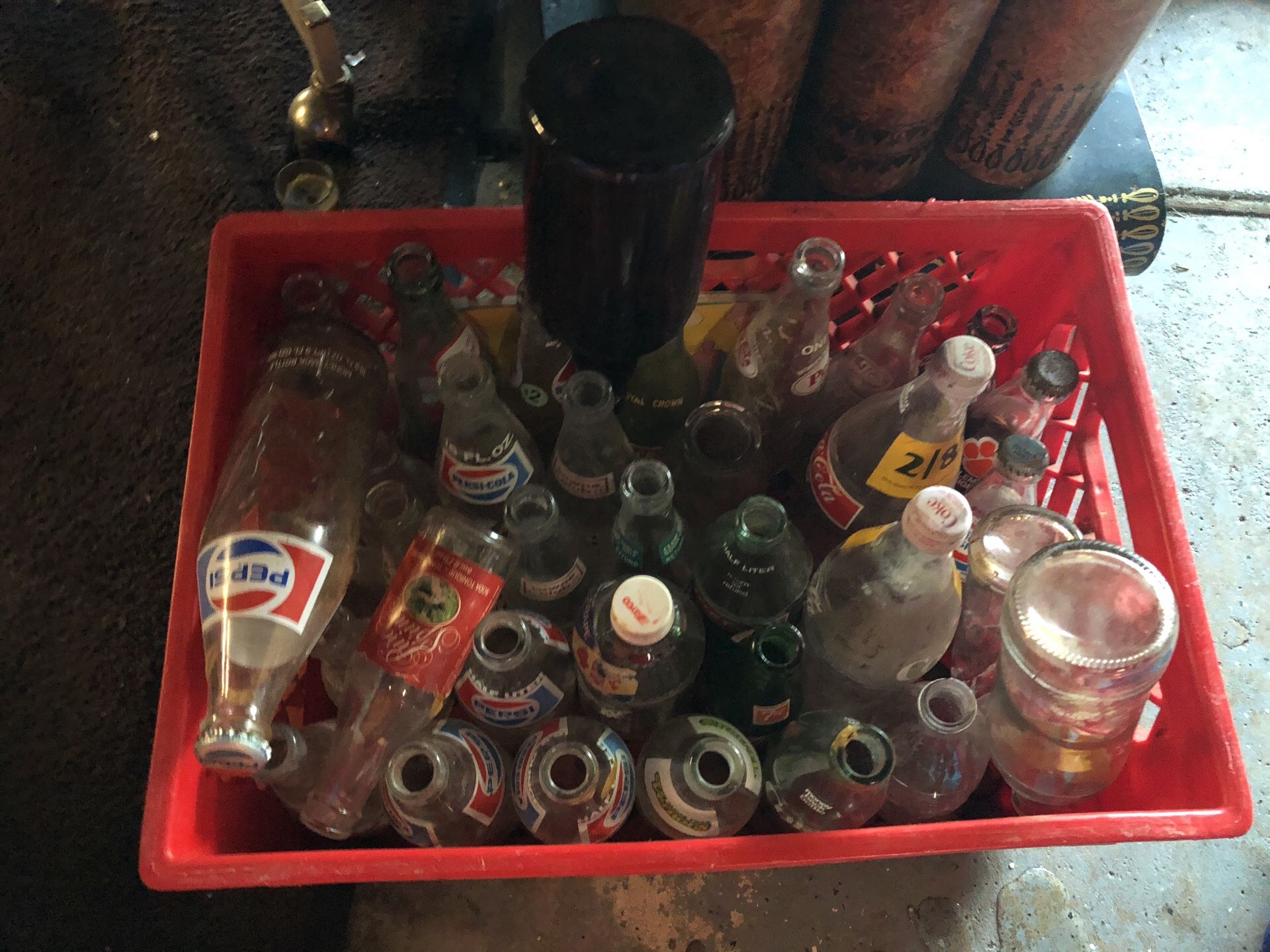 Old antique glass bottles of Pepsi Coca-Cola