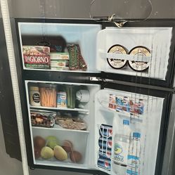 New In a box Mini Fridge! Retails for selling for