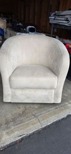 Ivory swivel chair