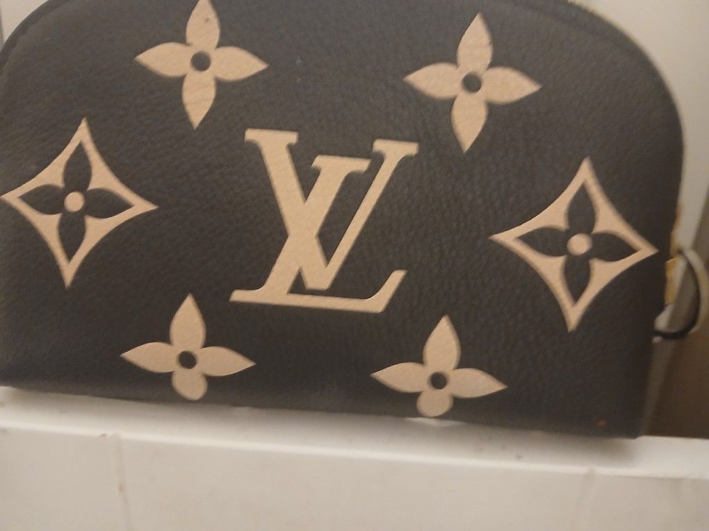 L. V. Coin Bag