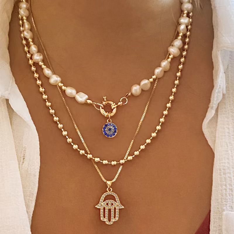 Alloy Diamond-Inlaid Multi-Layer Necklace – Women's Pearl-Eyed Palm Pendant Chain