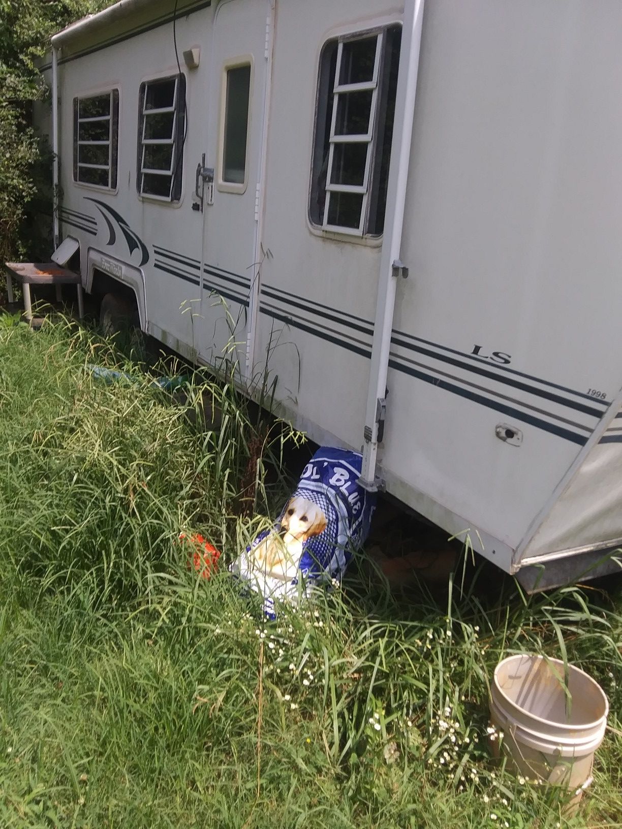 Fourwinds 28ft. Camper needs little TLC. But worth the money. + 95 Chevy suburban 5.7 2x4 lifted. + 93 suzuki intruder 1400. All need TLC. .