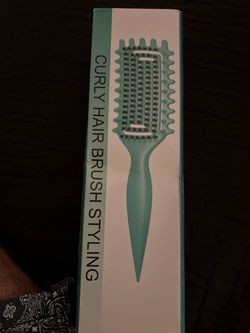 Curling hair brush
