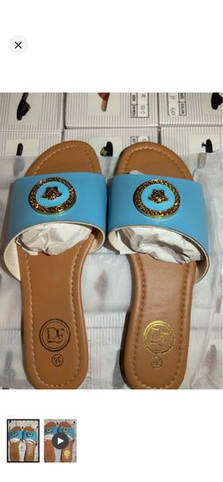 Women’s Blue slide mules with gold medallion