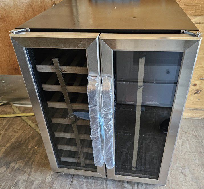 STAINLESS STEEL WINE COOLER AND BEVERAGE CENTER.....20 WINE BOTTLES AND 78 CAN CAPACITY........NEW.......$ 350