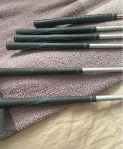 Women’s left handed irons, putter and driver