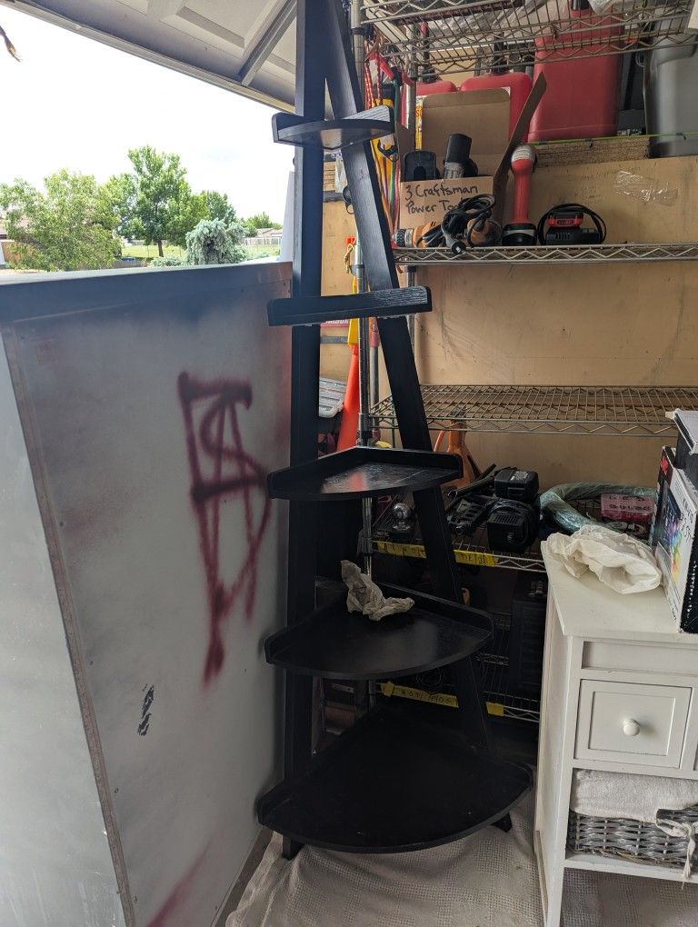 Corner stand shelving unit