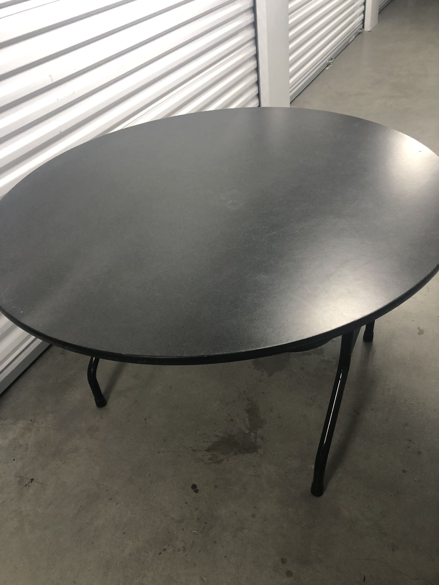 Gray Round Table  W/Folding Legs