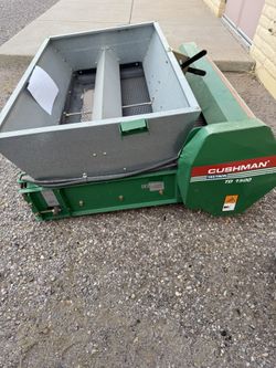 Cushman Textron TD 1500 Topdresser – Heavy-Duty Turf Spreader  Selling a Cushman Textron TD 1500 Topdresser, perfect for professional turf maintenance