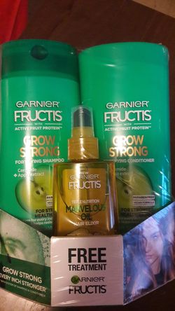 New 22fl.oz Garnier Shampoo & Conditioner w/ Hair treatment.