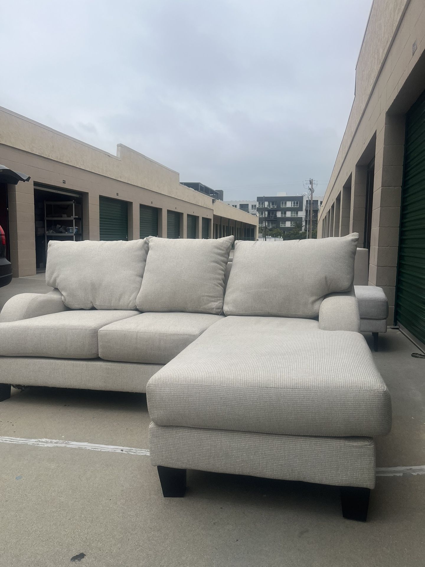 Beige Sectional Couch With Reversible Chaise *Delivery available*