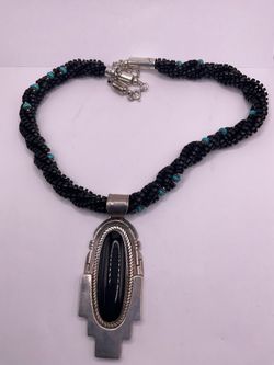 Native American jewelry with silver and black onyx