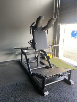 V Squat! Adjustable Foot Plate, Massive Arms…..