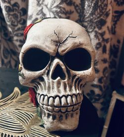 Decorative Skull Figurine with Floral Accents