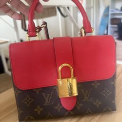 Louis Vuitton monogram Lock Purse 