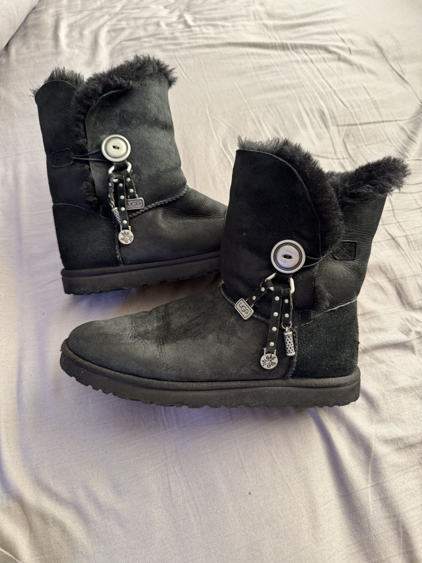 UGG Leather Boots with Button and UGG Charms. Folds down or Up. Women size: 11 (Men’s 9). Black Leather / Black Fur. 