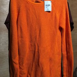 Women’s open back Sweater Size Small but is meant to be loose